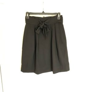 High-waisted, black skirt with bow